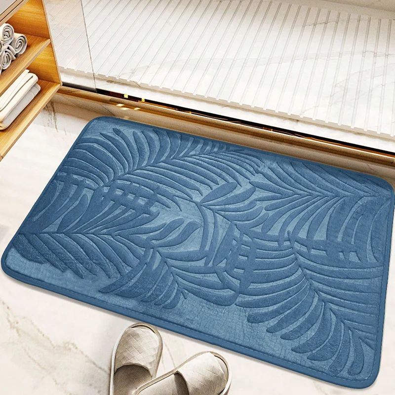 Tropisches Blattdesign Badmatte