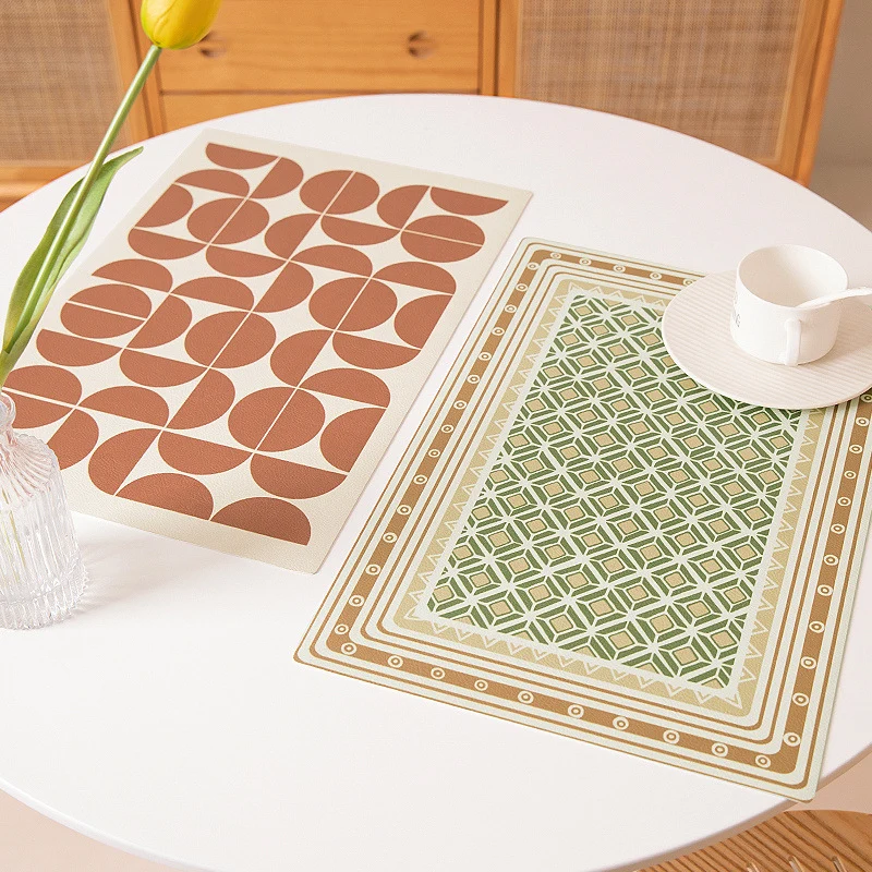 Runde abwischbare Tischunterlage aus PVC mit rutschfester Rückseite und retro-geometrischem Muster