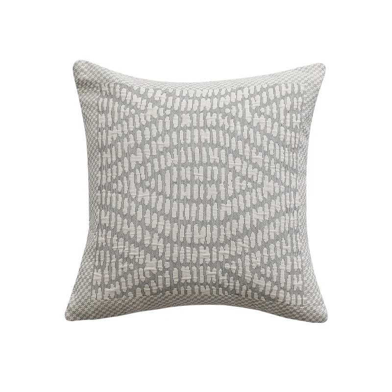 Quadratisches Sofa‑Zierkissen mit feiner gewebter Reliefstruktur und mittigem Kreisornament