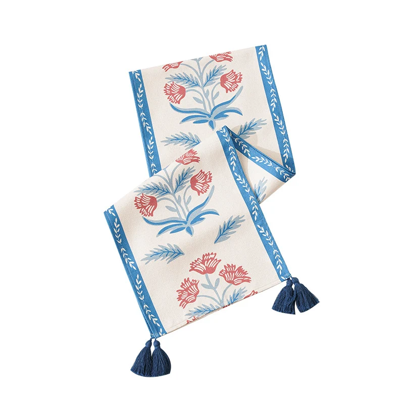 Tischläufer aus Leinenmischung mit floralen Blockdruck-Motiven und Quasten