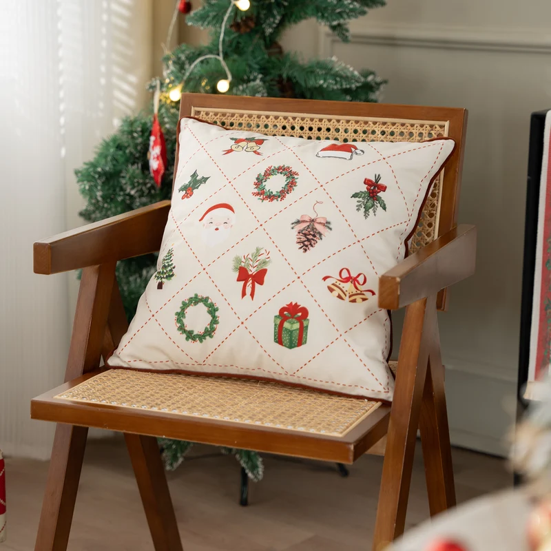 Rechteckiges Baumwoll-Dekokissen mit gestickten Weihnachtsmotiven und Paspel