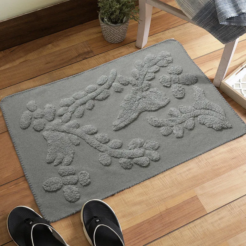 Rechteckige Baumwoll-Badematte mit abstraktem 3D‑Tuft‑Relief und rutschfester Rückseite