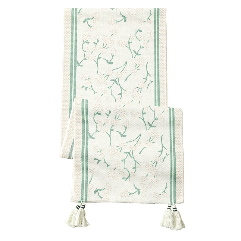Handgewebter Baumwoll-Tischläufer im Landhausstil mit zarten Blumenmotiven und Quasten