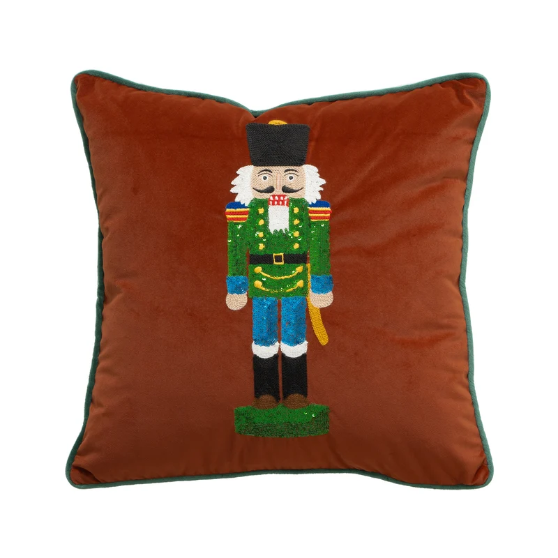 Weihnachtliches Dekokissen mit Nussknacker-Stickerei und Paspelrand
