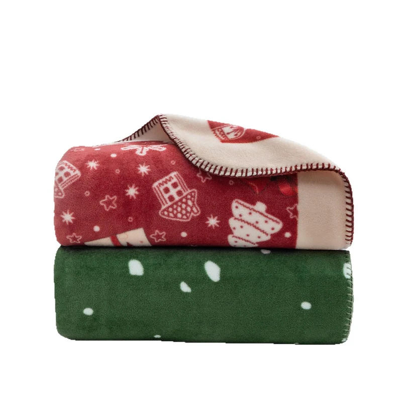Weihnachtskuscheldecke mit Geschenk- und Lebkuchenmuster