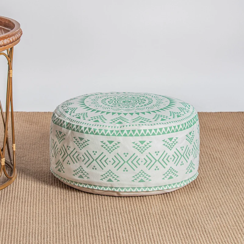 Runder gepolsterter Sitzpouf mit ethnischem Jacquardmuster und robustem Canvasbezug