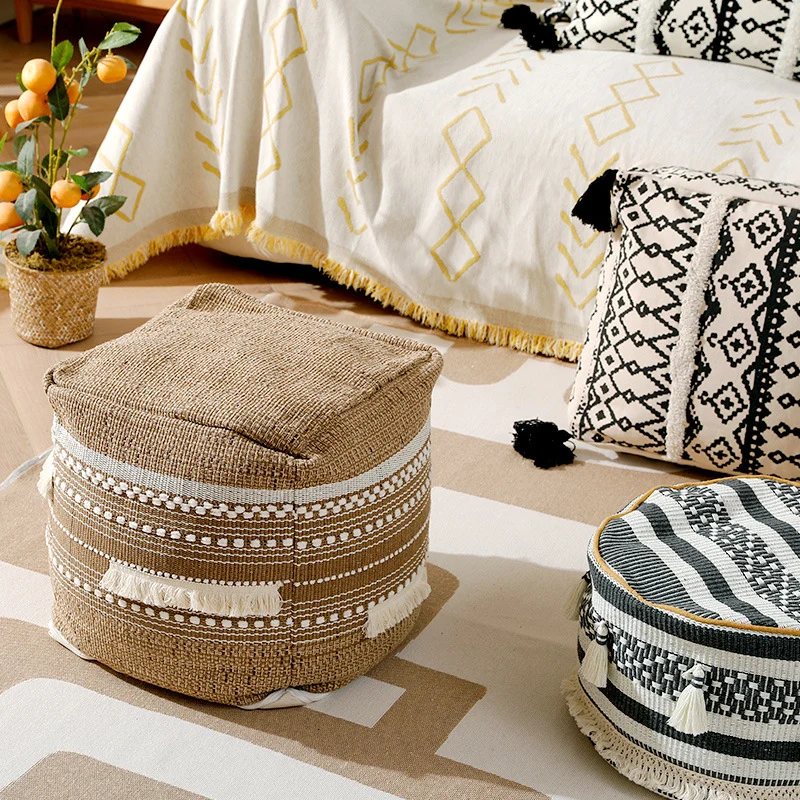 Gepolsterter Pouf Sitzhocker mit gewebter Struktur und Tragegriff