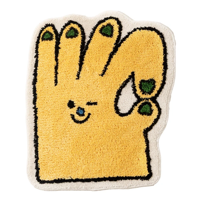 Geformter Badteppich in Handform mit tuftierter Chenille‑Textur und rutschfester Unterseite
