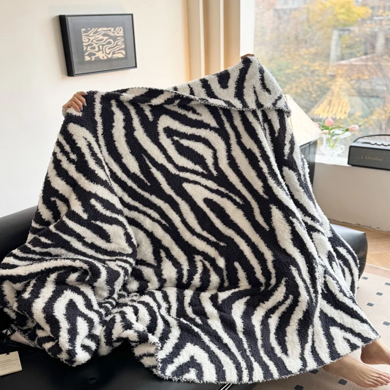 Gemütliche dekorative gemusterte Decke