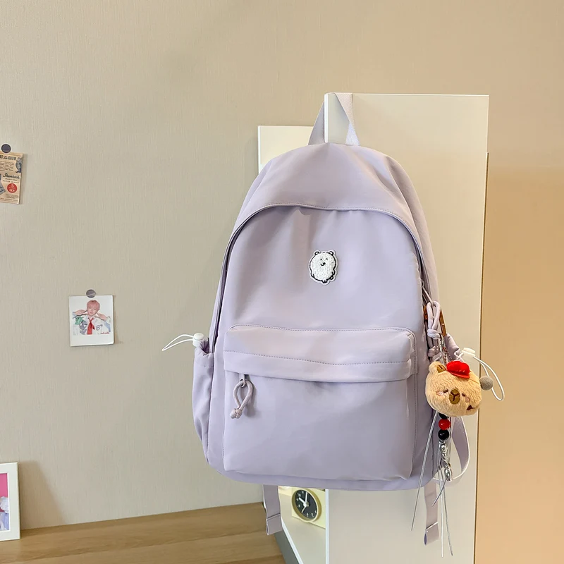 Lässiger leichter Rucksack mit süßem Charakter-Anhänger Karnz