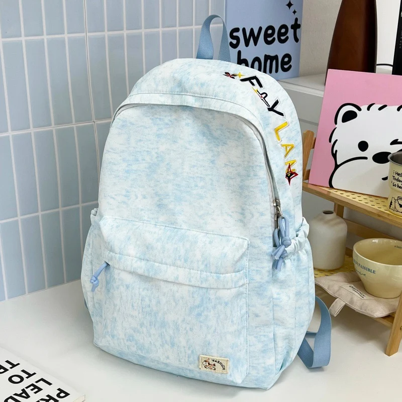 Lässiger weicher Stoff Rucksack mit süßem Charm Karnz