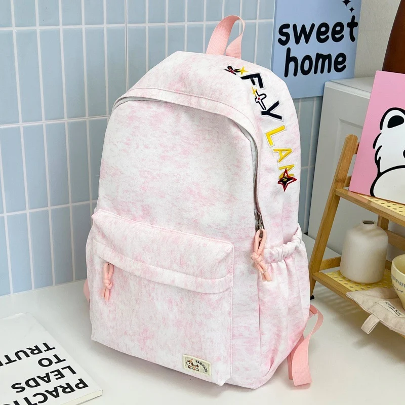 Lässiger weicher Stoff Rucksack mit süßem Charm Karnz