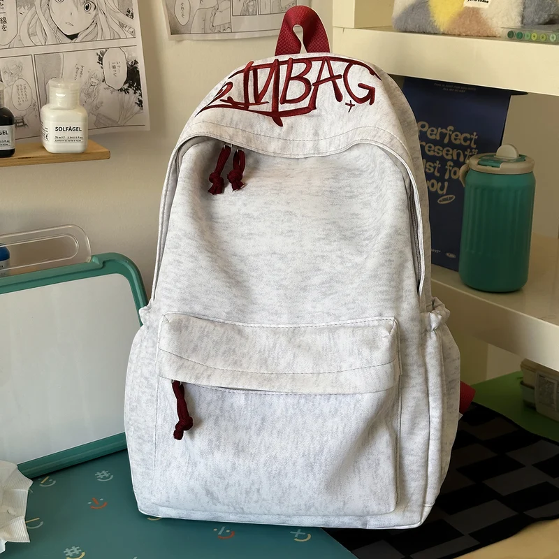 Lässiger Rucksack mit süßem Plüsch-Schlüsselanhänger Karnz