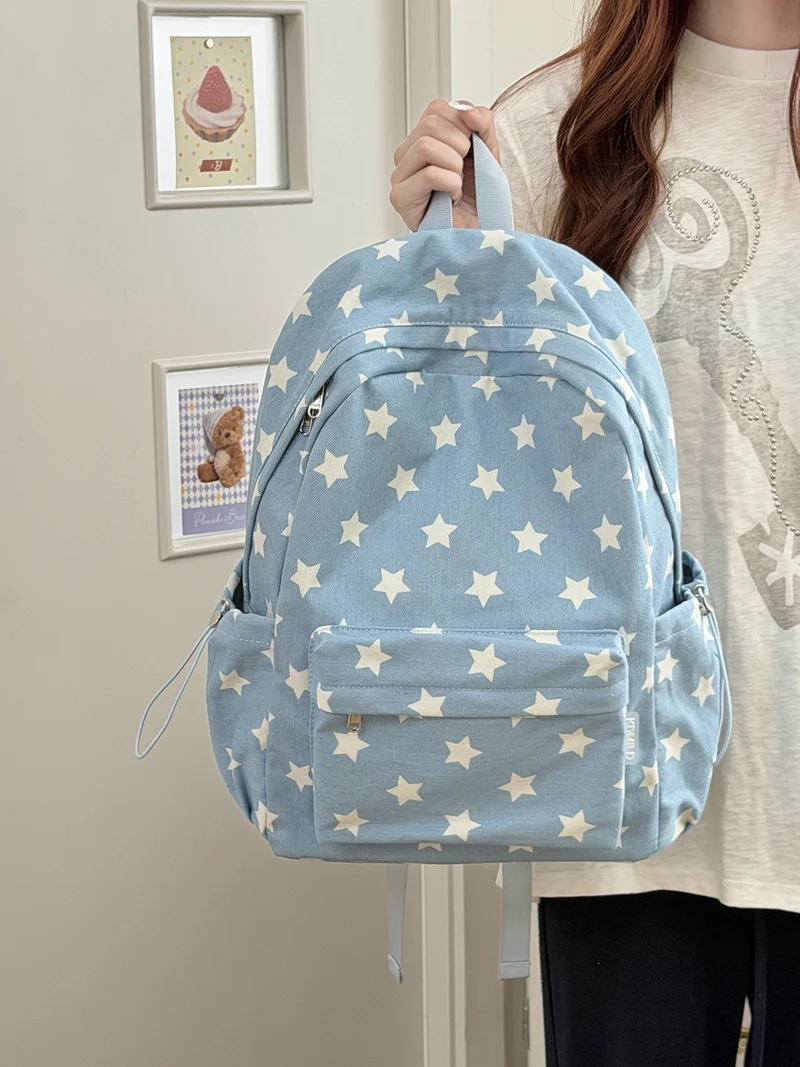 Verspielt gepunkteter Rucksack Karnz