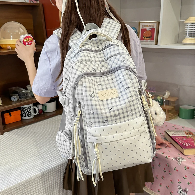 Dekorativer Rucksack mit Karos und Sternenmuster Karnz